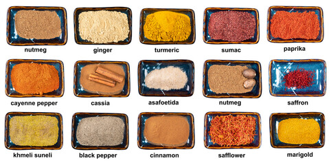 set of various ground spices in bowls with names