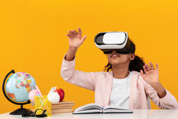Excited African American School Girl Wearing Virtual Reality Glasses