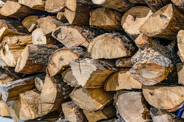 A stack of sawn and chopped firewood for heating residential and industrial premises.