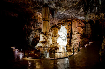 Postojna cave, Slovenia. Formations inside cave with stalactites and stalagmites.