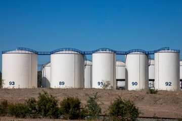 industrial fuel storage tanks at oil terminal