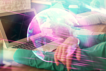 Double exposure of man and woman working together and tech hologram drawing. Technology concept. Computer background.