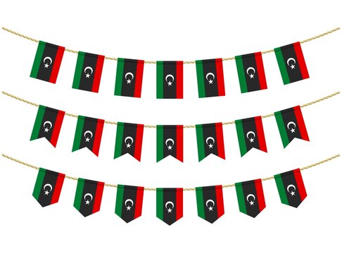 Libya flag on the ropes on white background. Set of Patriotic bunting flags. Bunting decoration of libya flag