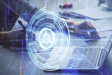 Multi exposure of woman hands working on computer and data theme hologram drawing. Tech concept.