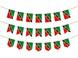 Saint Kitts and Nevis flag on the ropes on white background. Set of Patriotic bunting flags. Bunting decoration of Saint Kitts and Nevis flag