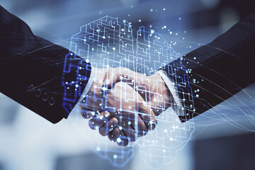 Double exposure of brain hologram and handshake of two men. Partnership in IT industry concept.