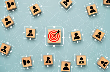 Red dartboard and black arrow connection linkage with human icon for customer focus target group...