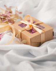 Eco-friendly gift packaging made of kraft paper. Eco style holiday concept. Valentines day, mother'day