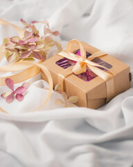 Eco-friendly gift packaging made of kraft paper. Eco style holiday concept. Valentines day, mother'day