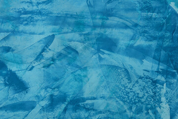 Blue modern abstract background. Texture blu Venetian plaster. Effects drawing brush, trowel on wall