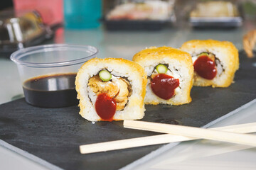 Fushion food of cooked and hot chicken sushi