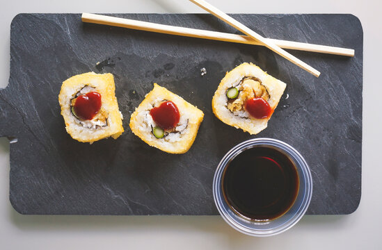 Fushion food of cooked and hot chicken sushi