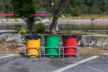 Garbage bin in public park. colorful trash bin. wheelie bin for rubbish, Public trash background