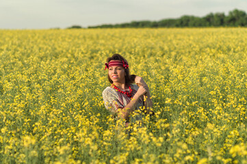 girl in spring blossoming field
