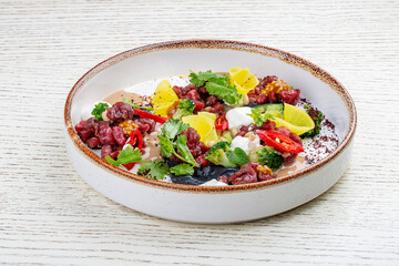 Tartar with eggplant mousse and Greek yogurt.