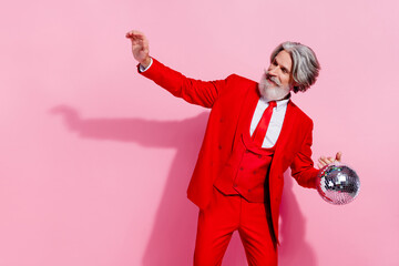 Portrait of funny carefree person enjoy discotheque night club feel young isolated on pink color background