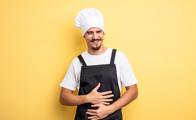 chef man laughing out loud at some hilarious joke