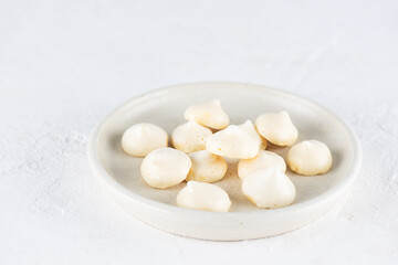Aquafaba meringue on a plate. Sugar, lactose free, vegan dessert.