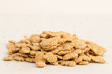 Makar Sankranti Gajak Or Lohri Mithai Shahi Khasta Rewri Also Known As Gur Rewadi, Gud Rewari, Revdi Or Revri Made Of Til Roasted In Desi Ghee, Jaggery, Laung And Elaichi. Isolated On White Background