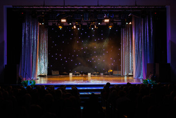 Theatrical scene without actors, scenic light and smoke
