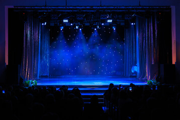 Theatrical scene without actors, scenic light and smoke