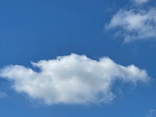 Blue sky and fluffy clouds