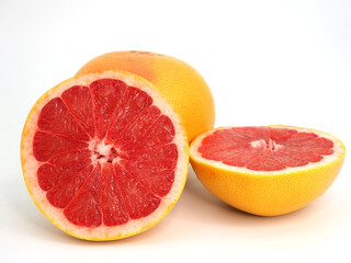 Fototapeta na wymiar Red grapefruit whole and halved