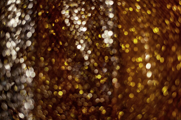 Holiday gold glowing glittering backdrop. Defocused background with glitter. Blurred bokeh.