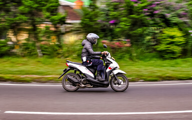 Fototapeta na wymiar Random Motorbiker at the street