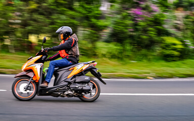 Obraz na płótnie Canvas Random Motorbiker at the street