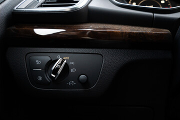 Obraz na płótnie Canvas light control panel in a modern car close-up