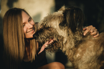 girl with a big dog portrait close-up