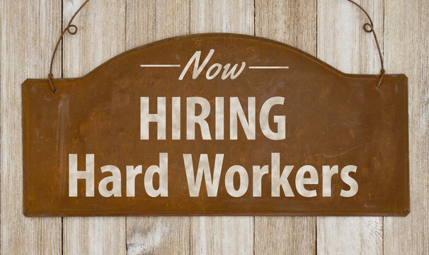 Now Hiring Hard Workers retro rusted sign with wood
