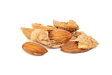 A heap of almonds in the shell and without