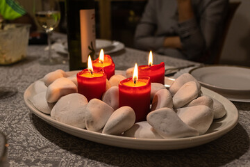Advent wreath with four red candles candles mark the celebration of Christmas.