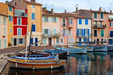 Colorful houses and traditional "pointu" fishing boats in Martigues, France..