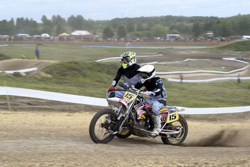 Obraz na płótnie Canvas motocross rider on a motorcycle