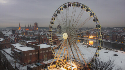 Gdańsk, Poland. 25.12.2021. The observation wheel in Gdańsk seen from a drone in a beautiful...