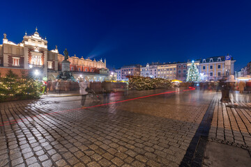 Naklejka premium Krakow, Poland December 15, 2021; The architecture of the city of Krakow in the Lesser Poland Voivodeship in the evening time