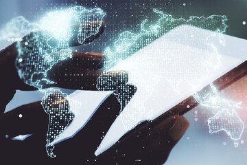 Multi exposure of abstract graphic world map and hand working with a digital tablet on background, big data and networking concept