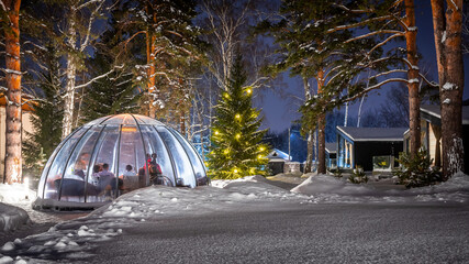 Dinner outdoors in a bubble in winter weather, lots of snow around to promote social distancing.