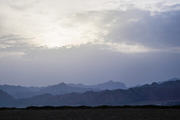 Clouds over the mountains in Dahab Egypt
