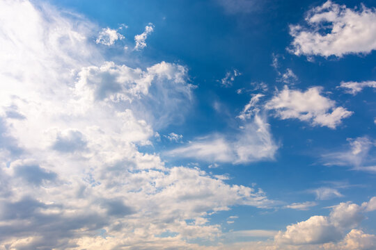 white clouds on the blue sky. sunny weather in the morning. beautiful nature background