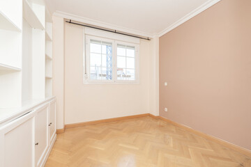 white lacquered wooden bookcase bedroom with herringbone parquet floor