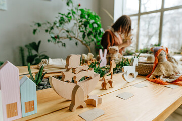Eco wooden kids toys with price tags on the table at shop