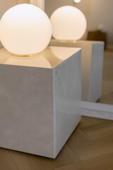 Cabinet made of stone with a luminous round lamp