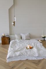 Fototapeta na wymiar Sleeping mattress in the candle room Minimalistic interior