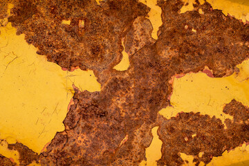 Aged yellow metal sheet with fully covered brown rustic texture for background