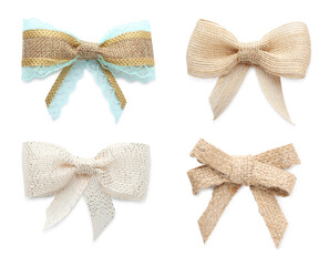 Set with different pretty burlap bows on white background
