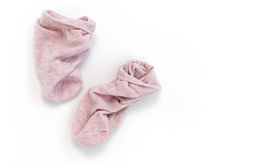 pair of worn socks isolated on white background